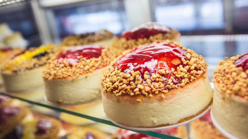 Cheesecake sits for sale in the bakery display counter of Junior's Cheesecake. The restaurant is one of several offering deals for National Cheesecake Day. (Photo by Andrew Burton/Getty Images)