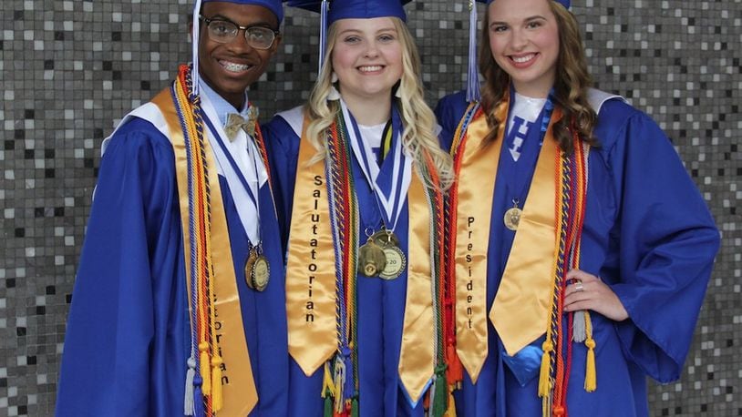 Hamilton High School valedictorian, Daniel Sutton, will be attending Duke University and he is one of 300 top student leaders in the nation to receive the prestigious Gates Scholarship. Sutton, left, is pictured at Hamilton’s recent commencement ceremony with salutatorian Allison Sharp and class president Jadyn Hendershot.