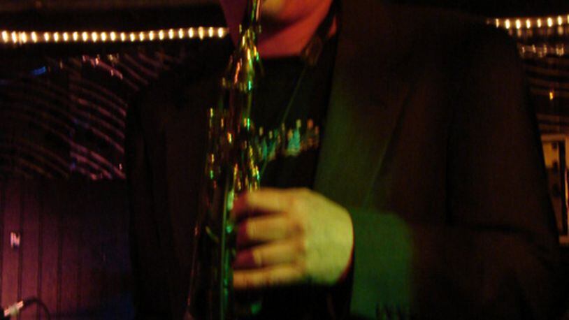 Chuck Evans plays sax during a previous year’s Blue Christmas concert. CONTRIBUTED