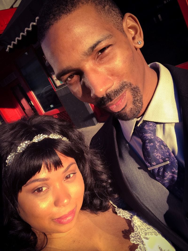Brandon Cooper with his wife, Brittney Cooper. Brandon Cooper was shot and killed Wednesday morning while driving for Lyft. / CONTRIBUTED