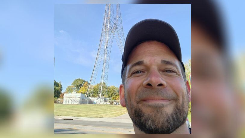 Eric Judd, of Fairfield, is pictured on Tuesday, Oct. 11, 2022, walking to Great American Ball Park from his Butler County home. He’s making the 20-plus-mile journey to raise money for the Joe Nuxhall Miracle League Fields. He’s expected to get to the Reds home stadium at 2:30 p.m. Tuesday. CONTRIBUTED