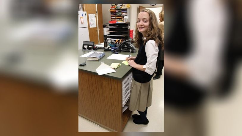 Mars Hill Academy freshman Anna Hayes works as an office aide. Born prematurely at just 25 weeks, she was given less than an 8 percent chance of survival. Today she is a thriving teen. CONTRIBUTED