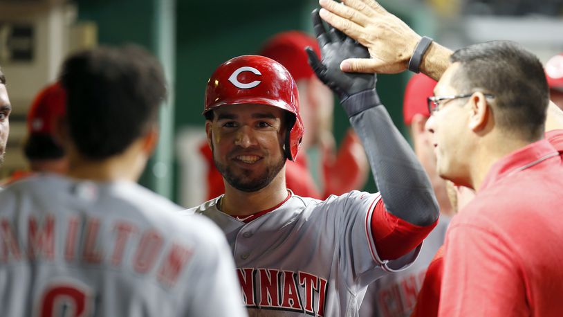 PITTSBURGH, PA - APRIL 10: Eugenio Suarez #7 of the Cincinnati Reds celebrates at the dugout after hitting a home run in the fifth inning against the Pittsburgh Pirates at PNC Park on April 10, 2017 in Pittsburgh, Pennsylvania. (Photo by Justin K. Aller/Getty Images)