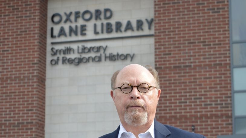 Curtis Ellison, president of the Lane Library board of trustees this year, stands in front of the Oxford Lane Library, which also houses the Smith Library of Regional History. CONTRIBUTED/BOB RATTERMAN