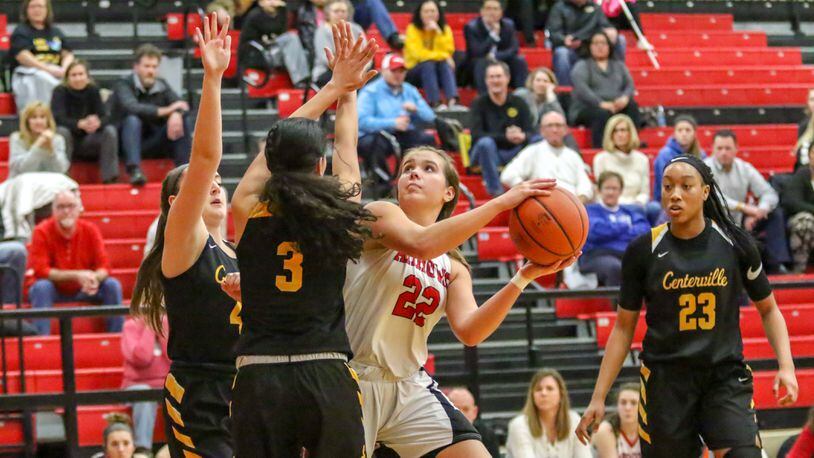 Tecumseh High School senior Corinne Thomas shoots the ball in traffic during an Arrows game against Centerville. CONTRIBUTED PHOTO BY MICHAEL COOPER