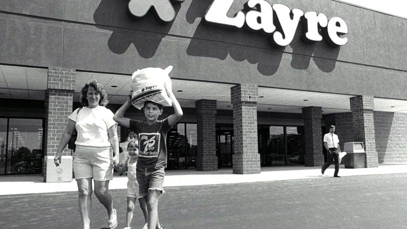 Sandy Johnson of Hamilton leaves the Zayre store on Ohio 4 in Hamilton with her children, Jennifer and Chad, in 1987.