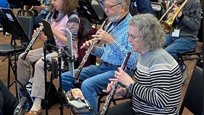 Anna Fricker, 69, (foreground) is co-chair of program promotions at UD’s New Horizons Music Program. CONTRIBUTION