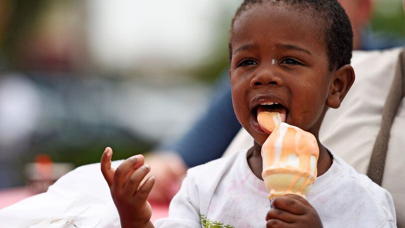 Darrion Johnson cools down with an ice cream cone duringa previous Union Centre Food Truck Rally. This year’s annual food truck rally at The Sqaure @ Union Centre takes place today, Aug. 10.