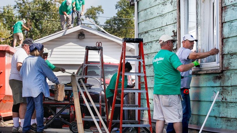 The coronavirus pandemic has but a hold on volunteers traveling to the Dayton region to repair homes damaged in Memorial Day tornadoes. Here, volunteers from Shiloh Church work Thursday, Sept. 19, 2019, to help repair Jessica Brady’s house in Harrison Twp. CHRIS STEWART / STAFF