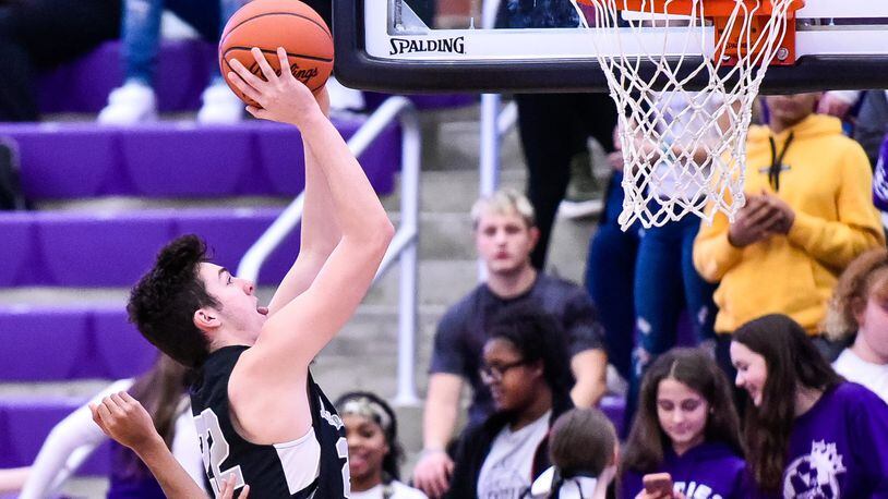 Lakota East’s Bash Wieland goes up for a shot during a basketball game against Middletown on Jan. 8 at Wade E. Miller Arena in Middletown. East won 61-47. NICK GRAHAM/STAFF