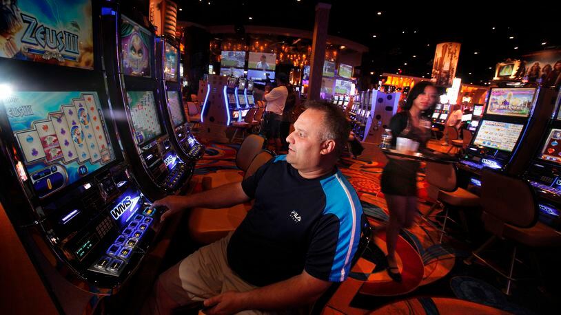 James Cairl from Toledo tries his luck on the floor of the Hollywood Casino in Columbus in a 2015 photo. (Dispatch photo by Tom Dodge)