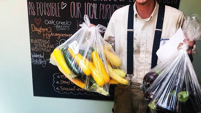 Kyle Hayden fromPatchwork Gardens in Trotwood delivers locally grown produce. From the farm to the table, items from patchwork travel just 10 miles. Produce from Patchwork Gardens will take center stage at Lily’s Bistro upcoming Very Veggie Feast event on Aug. 14. CONTRIBUTED