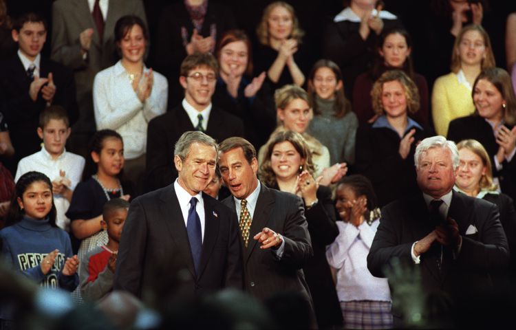 President George W. Bush signing No Child Left Behind Act at Hamilton High School Jan. 8, 2002.