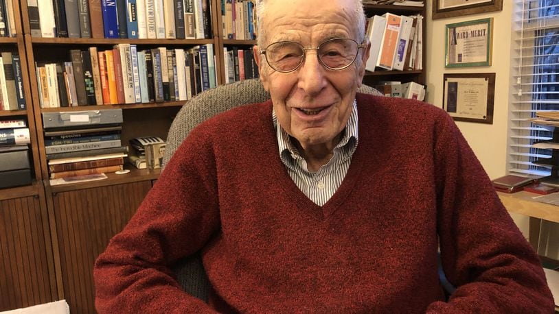 Dr. Al Miller, 97, a Holocaust survivor, was an optometrist in Hamilton for more than 40 years before retiring and moving to Deerfield Twp. Miller makes about 50 to 60 speaking engagements a year to talk to students about the Holocaust. He converted a bedroom into an extensive library. RICK McCRABB/STAFF