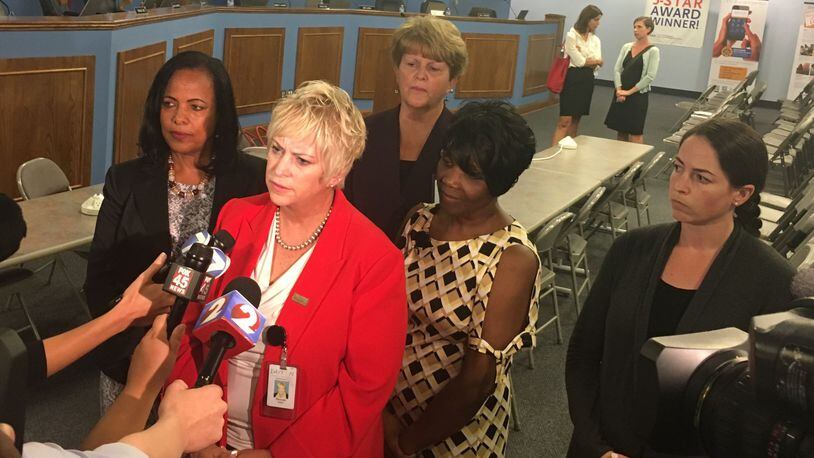 Dayton Public Schools administrators address media questions about their contract dispute with teachers in August. From left are Treasurer Hiwot Abraha, Superintendent Rhonda Corr, Associate Superintendent Elizabeth Lolli, Associate Superintendent Shelia Burton and legal counsel Jyllian Bradshaw. JEREMY P. KELLEY / STAFF