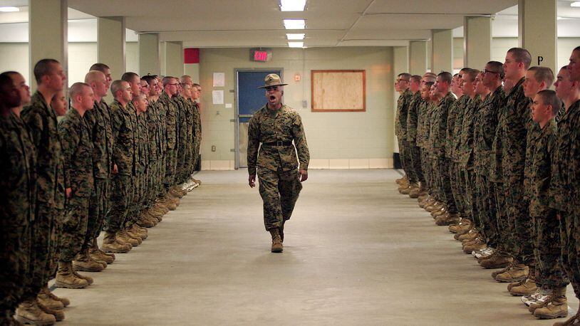 PARRIS ISLAND, SC - United States Marine Corps senior drill instructor Staff Sergeant Hugo Cherena (C) of Waterbury, Connecticut addresses his recruits during boot camp Parris Island, South Carolina. The boot camp is the same location Raheel Siddiqui was training at when he died. (Photo by Scott Olson/Getty Images)
