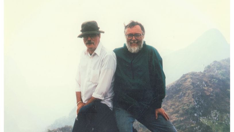 Mike Burgett and Don Kaufman are shown at the summit of Doi Chiang Dao after hiking up from the research station in Thailand in 1996. CONTRIBUTED