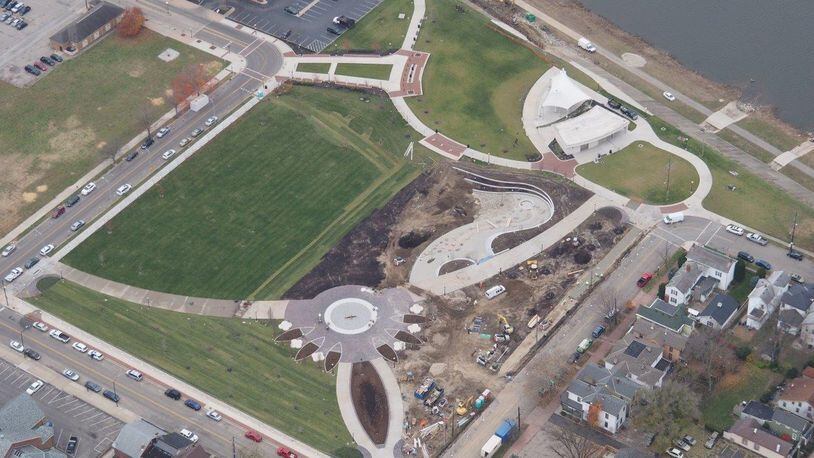 An aerial photo shows work on Hamilton’s new Marcum Park. A ribbon cutting is set for May 6. The white building in the upper right corner is the RiversEdge Amphitheater. CONTRIBUTED/CITY OF HAMILTON