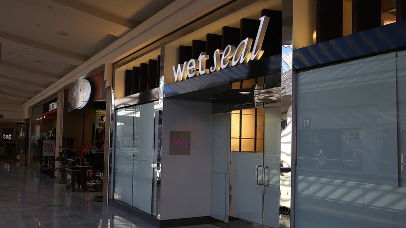 SAN FRANCISCO, CA - JANUARY 07: Paper covers the windows at a closed Wet Seal store on January 7, 2015 in San Francisco, California. Wet Seal, a teen clothing retailer, announced that it closed 338 of its retail stores and laid off nearly 3,700 employees at year. (Photo by Justin Sullivan/Getty Images)
