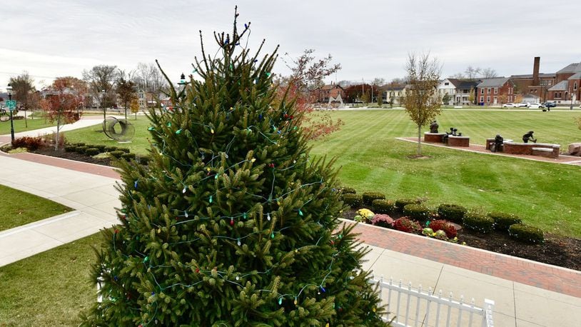 Last year, the Hamilton Christmas tree lighting was moved from the lawn of the Butler County Historic Courthouse to Marcum Park, and more than 2,500 people celebrated. It will happen there again this year, with more activities than last year. NICK GRAHAM/STAFF