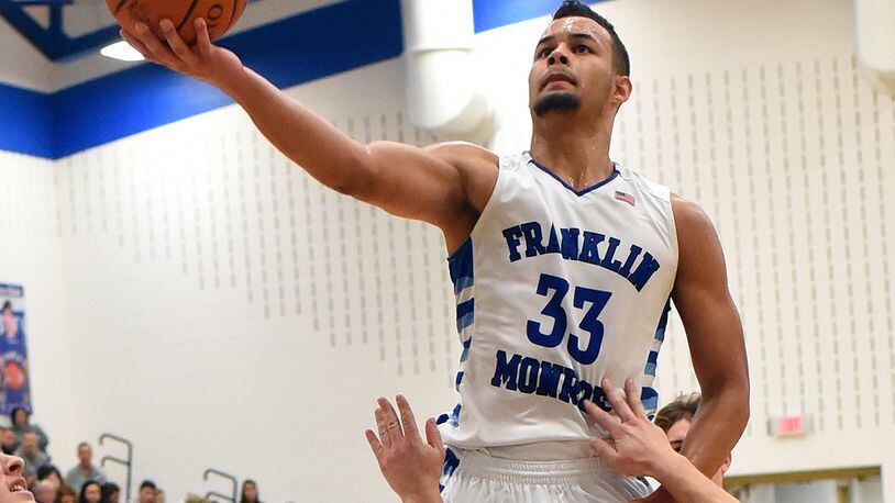 Franklin Monroe senior Ethan Conley scored a Jets’ record 54 points in a 92-80 defeat of visiting Houston on Dec. 8 and is the Southwest District D-IV player of the year. DALE BARGER / CONTRIBUTED