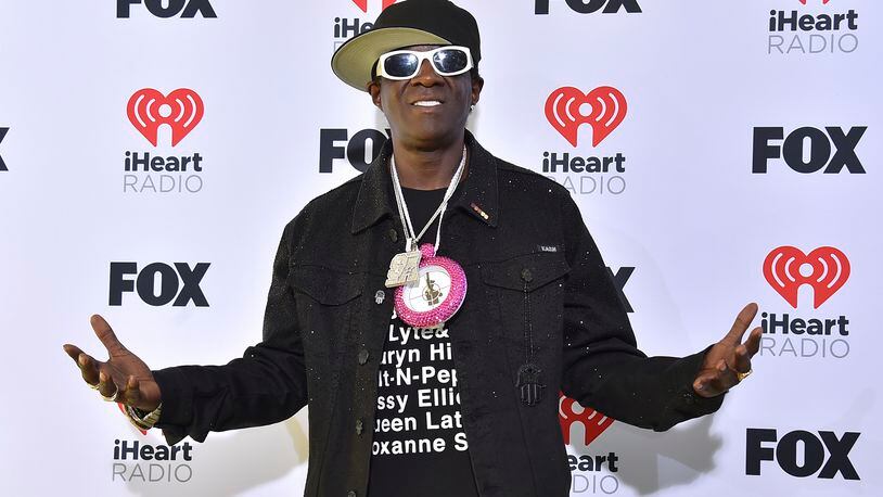 FILE - Flavor Flav arrives at the iHeartRadio Music Awards on Monday, April 1, 2024, in Los Angeles. Maggie Steffens asked for more support for the U.S. women's water polo team, and the captain received one particularly surprising response. From a clock-wearing rap icon.(Photo by Jordan Strauss/Invision/AP, File)