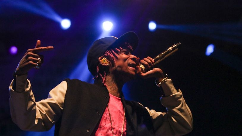 Wiz Khalifa performs at a music festival in 2014. The rapper performed at an Oxford bar in 2008. (TINA PHAN/AMERICAN-STATESMAN)