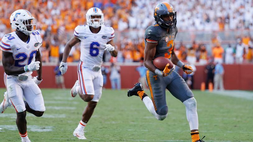KNOXVILLE, TN - SEPTEMBER 24: Josh Malone #3 of the Tennessee Volunteers runs into the end zone with a 42-yard touchdown reception against the Florida Gators in the fourth quarter at Neyland Stadium on September 24, 2016 in Knoxville, Tennessee. Tennessee defeated Florida 38-28. (Photo by Joe Robbins/Getty Images)