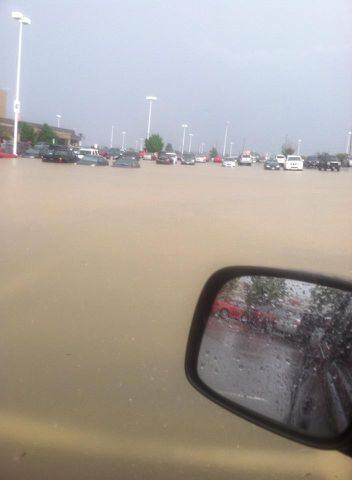 Flash floods submerge cars, roadways