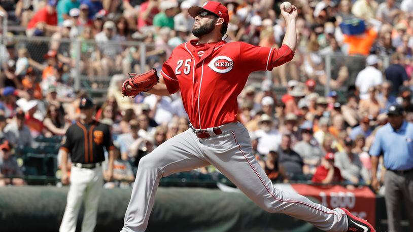 Cincinnati Reds’ Cody Reed throws during the first inning of a spring training baseball game against the San Francisco Giants, Monday, March 27, 2017, in Scottsdale, Ariz. (AP Photo/Darron Cummings)
