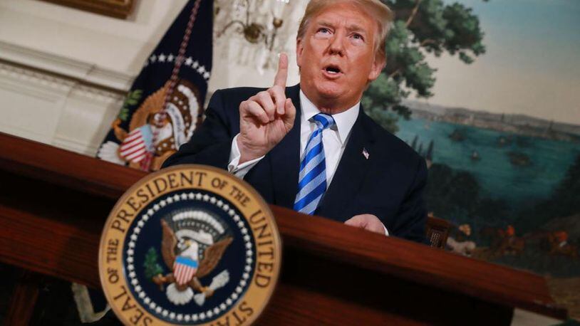 President Donald Trump announces his decision to withdraw the United States from the 2015 Iran nuclear deal in the Diplomatic Room at the White House May 8, 2018 in Washington, DC.