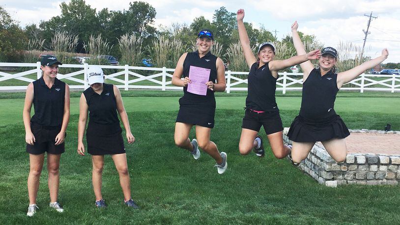 Three members of Lakota East’s girls golf team decided to jump for joy Tuesday after the Thunderhawks finished third in the Division I district tournament at Glenview Golf Course, earning a return trip to state. RICK CASSANO/STAFF