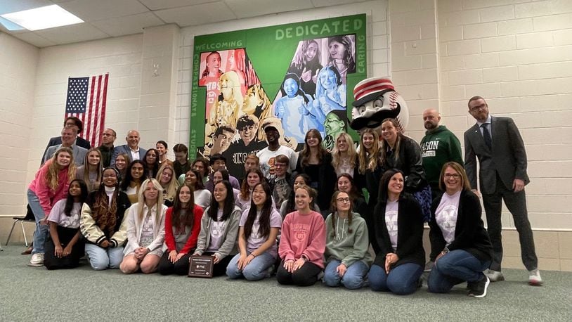 A new mural at Mason High School is intended to welcome new students. The mural was designed by artist Brent Billingsley in conjunction with members of Students Involving and Befriending Students, or SIBS. CONTRIBUTED