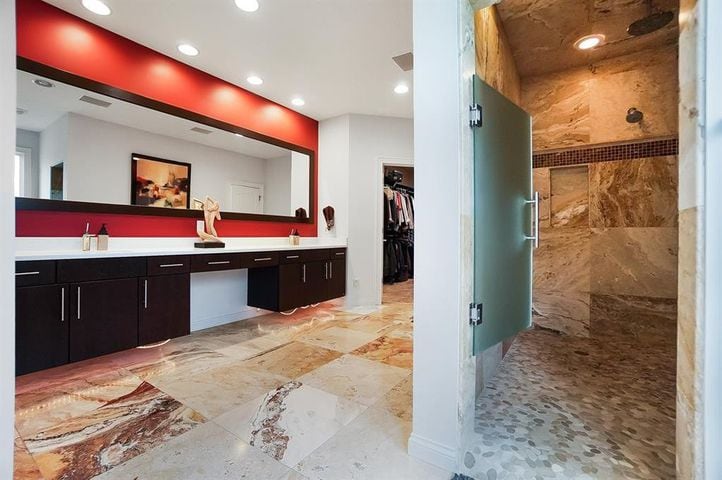 Photos: $1M luxury home listed has waterfall, swimming pool and kitchen to die for