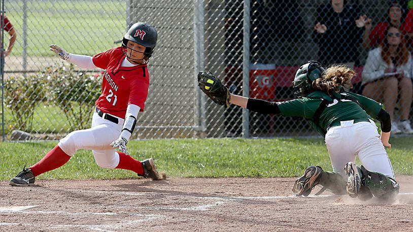 Madison’s Joey Brinegar gets around Badin catcher Hannah Broermann to score during a Division III sectional final at Preble Shawnee on May 16, 2016. CONTRIBUTED PHOTO BY E.L. HUBBARD
