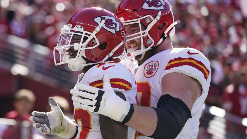 Kansas City Chiefs wide receiver Mecole Hardman, left, celebrates after scoring a touchdown with guard Joe Thuney during the first half of an NFL football game against the San Francisco 49ers in Santa Clara, Calif., Sunday, Oct. 23, 2022. (AP Photo/Godofredo A. Vásquez)