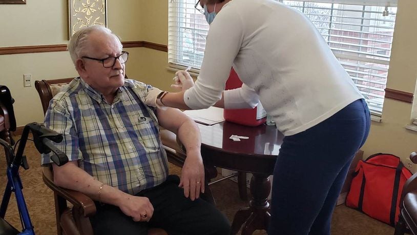 Resident Ron Colombe of Miller Farm Place senior living in Vandalia receives a COVID-19 vaccine dose. CONTRIBUTED