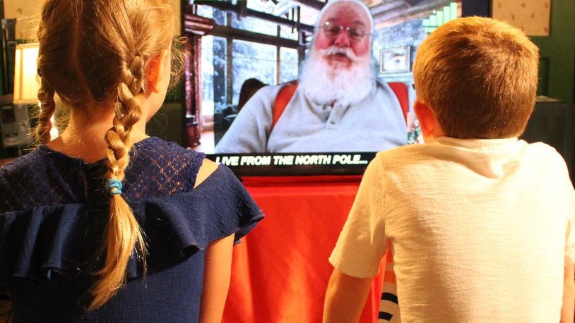 Children chat virtually with Santa from the North Pole during Christmas in July at EnterTRAINment Junction. CONTRIBUTED