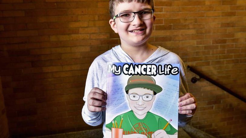 Matthew Harrison, 11, a sixth-grader at Chamberlain Middle School, was diagnosed with leukemia two years ago, and he recently wrote a book about his journey called, “My Cancer Life” produced by Smile Books Project. NICK GRAHAM/STAFF