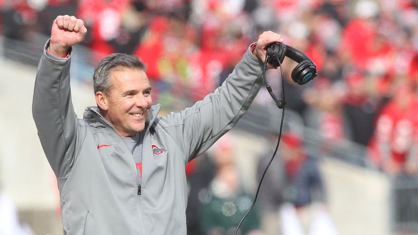 Ohio State’s Urban Meyer celebrates a tackle by the special teams against Michigan State on Saturday, Nov. 11, 2017, at Ohio Stadium in Columbus. David Jablonski/Staff