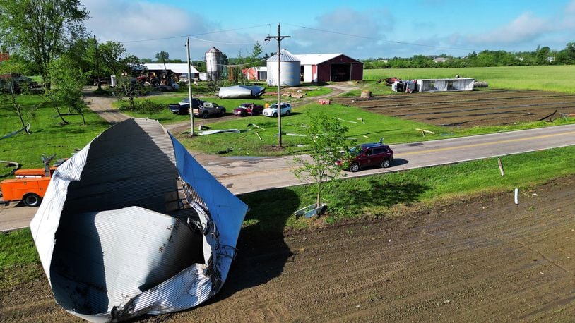 Damage from a suspected tornado from Tuesday, May 7, 2024, is shown in these images from Wednesday morning along Stillwell Beckett Road in Reily Twp. in Butler County. NICK GRAHAM/STAFF