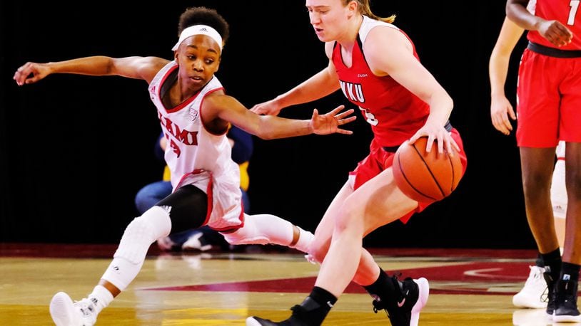 Miami University’s Lauren Dickerson defends Western Kentucky’s Whitney Creech during a WNIT game at in March, 2019, at Millett Hall in Oxford. WKU won 67-63. SCOTT KISSELL/MIAMI UNIVERSITY