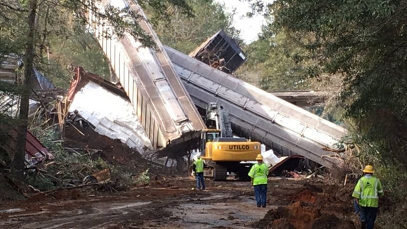 A train derailment south of Macon, Georgia, forces a town to evacuate.