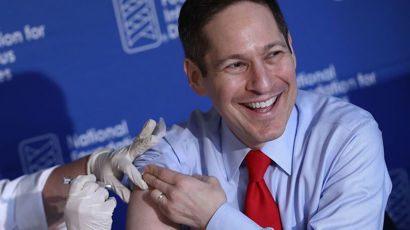 Dr. Tom Frieden, director of the Centers for Disease Control and Prevention, receives his annual flu shot during a press conference Sept. 29, 2016 in Washington, DC. Frieden took part in the news conference to highlight that millions of people get sick, hundreds of thousands are hospitalized and thousands to tens of thousands of people die from flu and related complications every year. (Photo by Win McNamee/Getty Images)