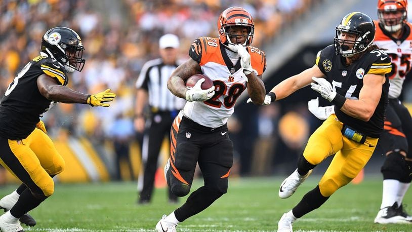 PITTSBURGH, PA - OCTOBER 22: Joe Mixon #28 of the Cincinnati Bengals carries the ball against the Pittsburgh Steelers in the first half during the game at Heinz Field on October 22, 2017 in Pittsburgh, Pennsylvania. (Photo by Joe Sargent/Getty Images)
