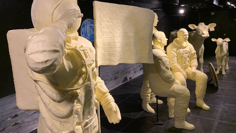 Wapakoneta native Neil Armstrong and fellow astronauts Buzz Aldrin and Michael Collins are carved out of butter for the 2019 Ohio State Fair display.