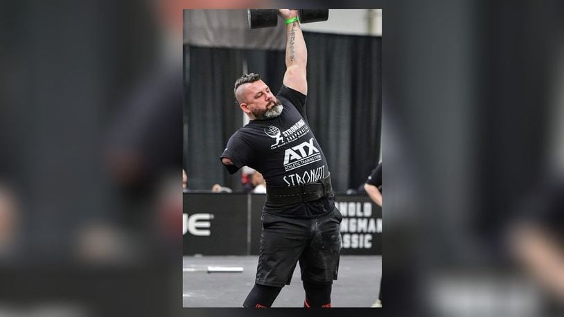 Middletown High School special education classroom assistant - and former firefighter - Mike Diehl inspires students through competing in international disabled athlete and strongman competitions. (Provided Photo\Journal-News)