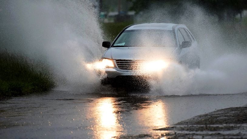 A car drives along Amanda Road in Middletown on Friday. NICK GRAHAM/STAFF