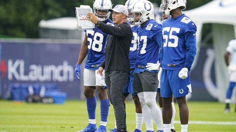 Indianapolis Colts special teams coordinator Bubba Ventrone runs a drill during practice at the NFL team's football training camp in Westfield, Ind., Wednesday, July 28, 2021. (AP Photo/Michael Conroy)