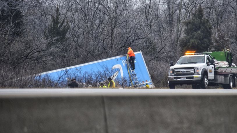 A crash involving a semi truck on its side caused a large backup on Interstate 75 in Butler County on Monday, Jan. 25, 2021. The crash happened just north of the rest stop near Monroe. NICK GRAHAM / STAFF